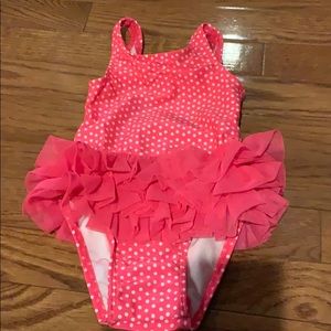 Pink and white polka dot bathing suit